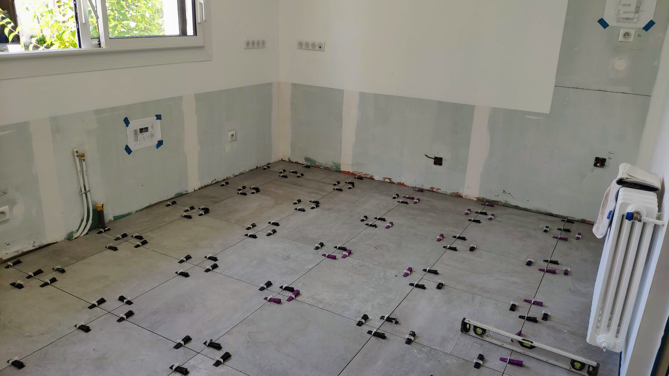 Installation du carrelage avec système de nivellement
