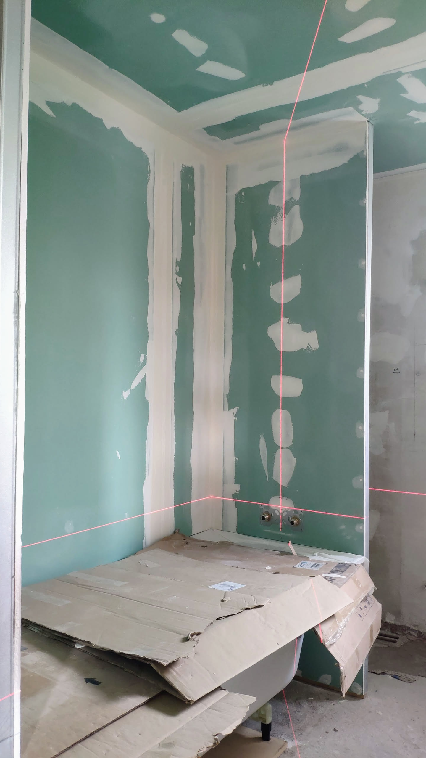 Panneaux de placo verts avec enduit de jointoiement