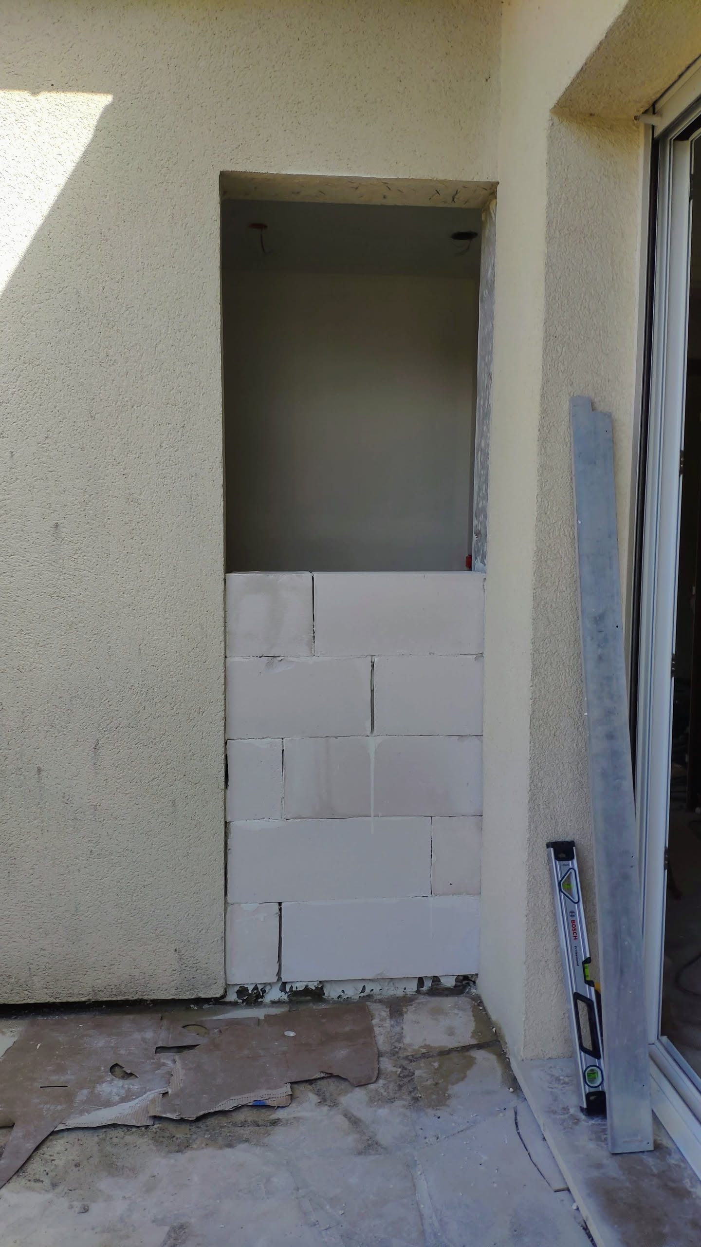 Fermeture de l'ouverture avec des blocs de béton cellulaire