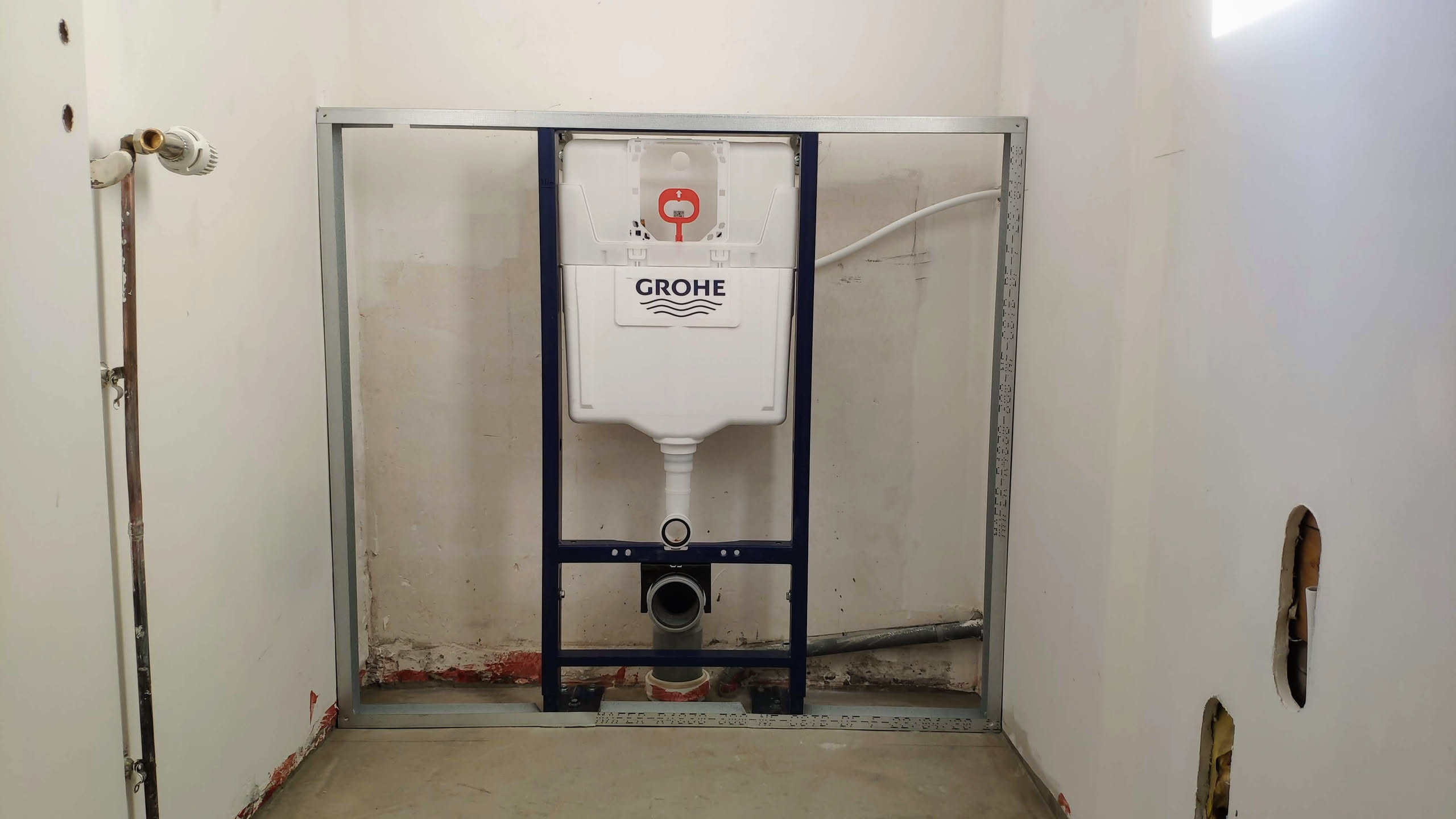 Installation du réservoir GROHE encastré